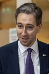 A picture of Simon Harris TD Minister for Further and Higher Education, Research, Innovation and Science from the chest up in a suit.