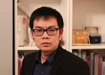 Dr-Hien-Quoc-Ngo pictured in front of bookcase