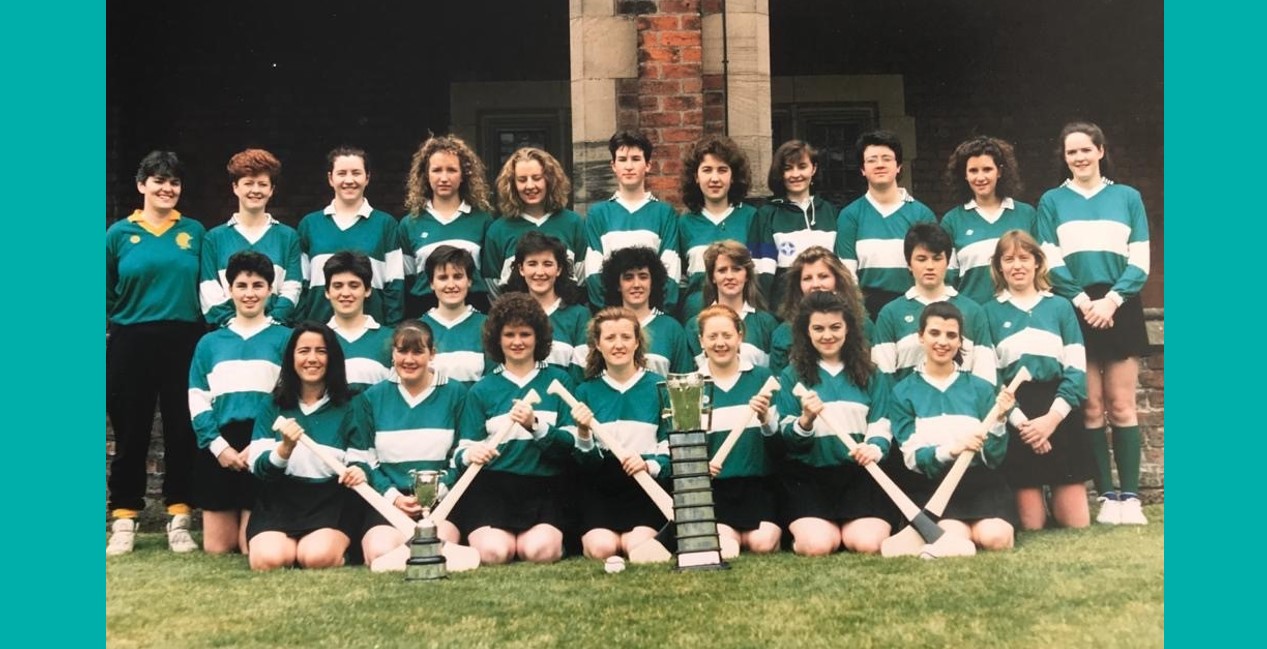 Members of the University's 1991 Ashbourne Cup-winning team, in green and white team shirts  in quad