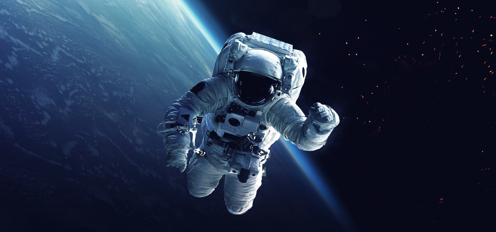 Spaceman doing untethered spacewalk with earth in background