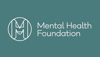 Mental Health Foundation logo, white on green writing with interwoven letters 
