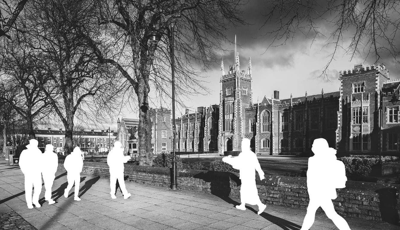 Monochrome image of Queen's Lanyon Building with white silhouettes of six people walking by