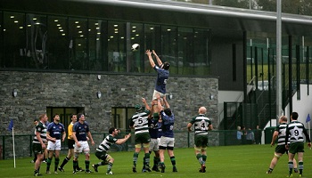 Line-out at rugby match being played at DUB Pavilion at Queen's