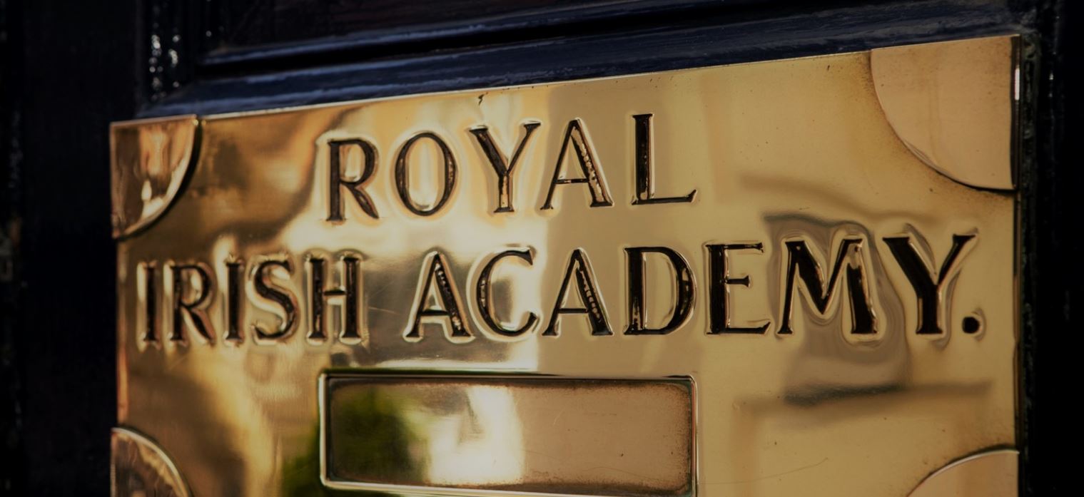 Royal Irish Academy on gold sign on solid black door