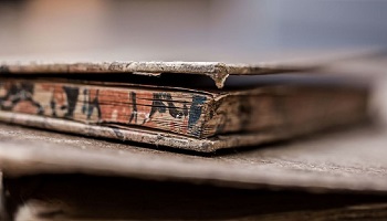Antique book on wooden table