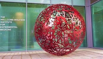 Red sphere outside WWIEM building at Queen's 