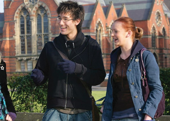 two students outside lanyon building