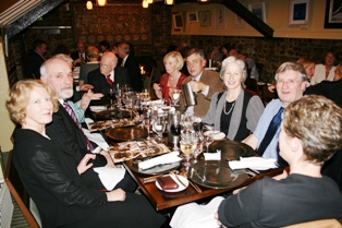 Group of Association Alumni socialising over a meal 